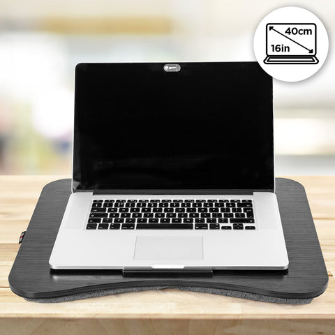 Duronic Laptop Tray with cushion base holding a 16-inch silver laptop on table.