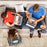 Duronic Laptop Tray with family using portable lap desks for laptops and tablets while relaxing together on a sofa.