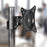 Duronic Monitor Arm Stand VESA Head attached to a metal desk pole for dual screen setups.