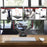 Duronic Monitor Arm Stand holding two displays over a wooden desk.