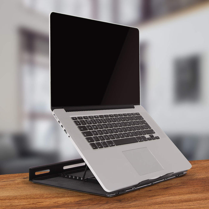 Duronic Monitor Laptop Stand set on a wooden desk with blurred background..