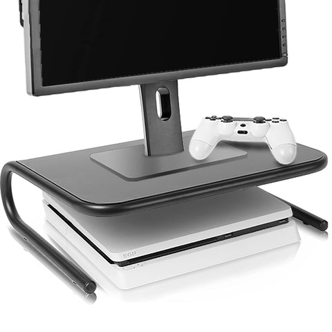 Duronic Monitor Stand Riser holding a computer screen and white controller over a game console.