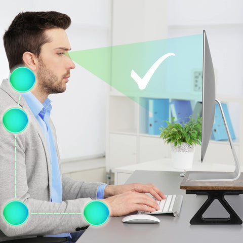 Duronic Monitor Stand Riser with man demonstrating correct sitting posture and eye-level screen alignment.