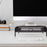Duronic Monitor Stand Riser with storage drawer on a white desk with computer and keyboard.