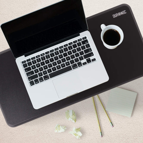 Duronic Monitor Stand Riser with top view of a silver laptop, coffee cup, and desk mat on a workspace surface.