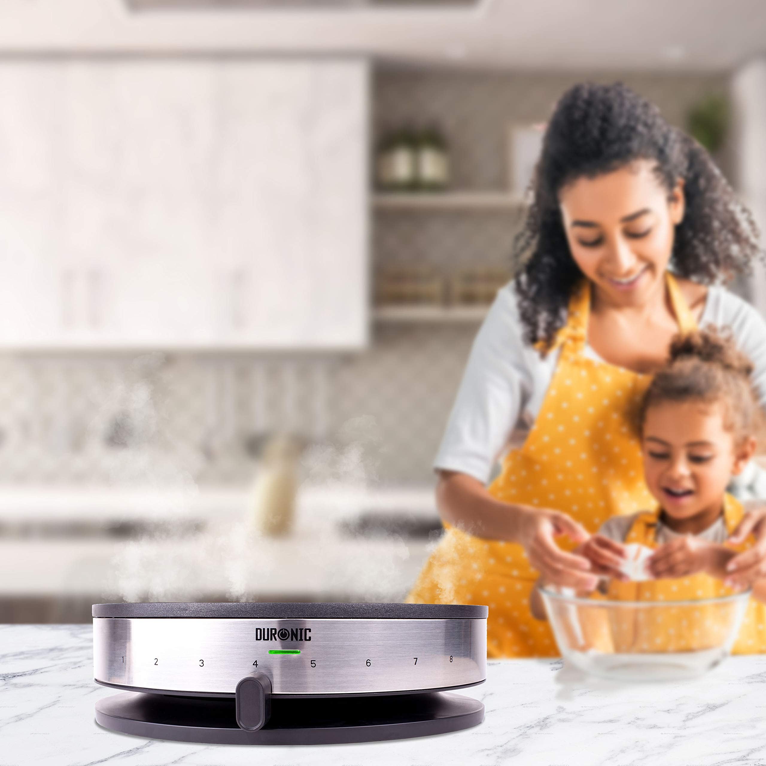 Duronic PM131 electric crepe maker placed on an aesthetic kitchen countertop with a family preparing ingredients