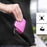 Duronic Pink Hard Drive Case into a black hoodie pocket, highlighting its portable and protective design.