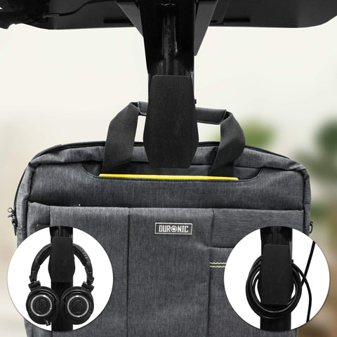 Duronic Projector Stand holding a grey laptop bag, headphones, and coiled cables.