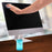 Duronic Screen Cleaner with Hand wiping a computer screen with a microfiber cloth next to a blue spray bottle.