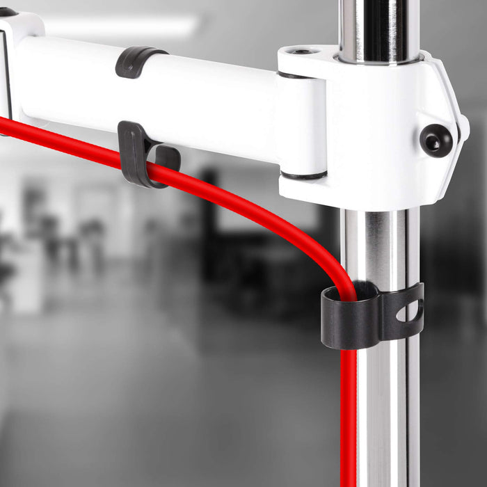 Duronic Single Monitor Arm with integrated cable management clips holding a bright red power cord.