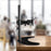 Duronic Single Monitor Stand with a crescent base, adjustable arm, and tilting VESA mount plate.