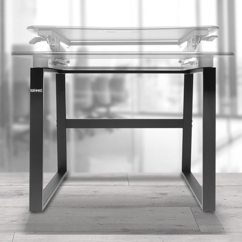 Duronic Sit-Stand Desk Frame featuring black metal legs on a wooden floor.