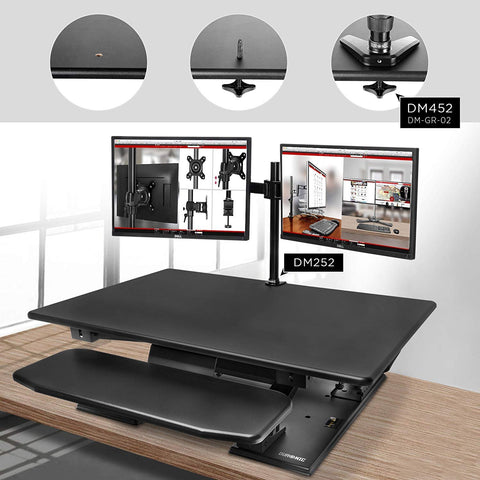 Duronic Sit-Stand Desk attached to a black standing desk converter via a grommet hole.