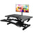 Duronic Sit-Stand Desk featuring a dual-tier design with a mounted computer monitor.