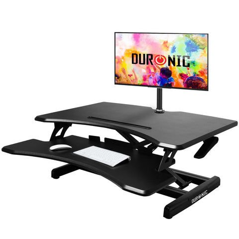 Duronic Sit-Stand Desk featuring a dual-tier design with a mounted computer monitor.