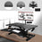Duronic Sit-Stand Desk featuring a monitor mount, keyboard tray, and adjustable height frame.