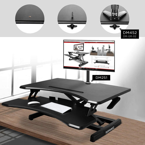 Duronic Sit-Stand Desk featuring a monitor mount, keyboard tray, and adjustable height frame.