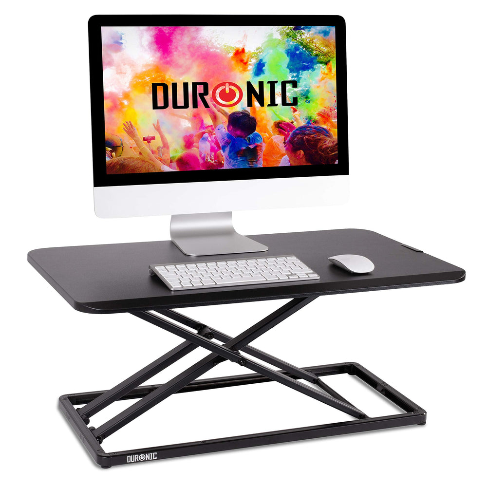 Duronic Sit-Stand Desk holding an Apple computer, wireless keyboard, and mouse.