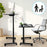 Duronic Sit-Stand Desk shown in both sitting and standing positions with a grey chair.