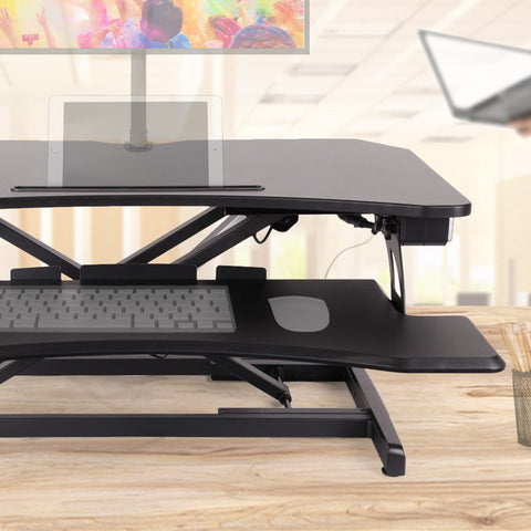 Duronic Sit-Stand Desk with a keyboard tray, tablet slot, and monitor mount.