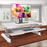 Duronic Sit-Stand Desk with a monitor and keyboard on a wooden table.