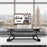 Duronic Sit-Stand Desk with a monitor mount, holding a screen on a table.