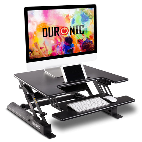 Duronic Sit-Stand Desk with a monitor, tablet, and keyboard setup.