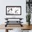 Duronic Sit-Stand Desk with an iMac, keyboard, and mouse on a wooden office desk.