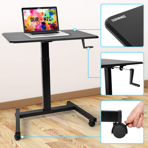 Duronic Sit-Stand Desk with black tabletop, laptop, and hand crank mechanism.