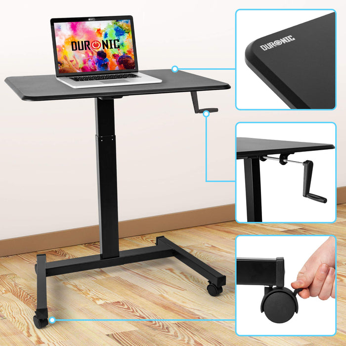 Duronic Sit-Stand Desk with black tabletop, laptop, and hand crank mechanism.