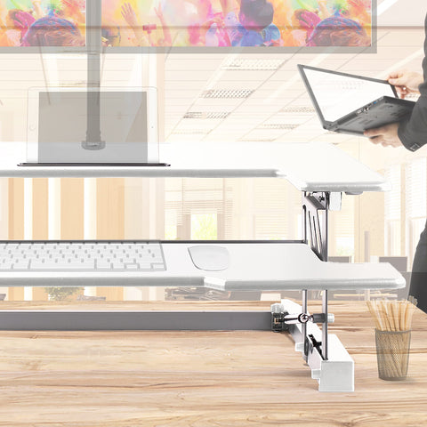Duronic Sit-Stand Desk with keyboard tray, laptop, and tablet holder on wooden desk.