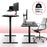 Duronic Sit Stand Desk Frame shown in both sitting and standing positions with a 220-pound weight capacity.