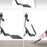 Duronic Sit Stand Desk Mount flips up to clear desk space for easy cleaning with a vacuum.