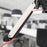 Duronic Sit Stand Desk Mount with integrated cable management slot holding a bright red cord.
