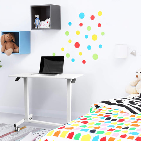Duronic Sit Stand Desk Top with laptop in a colorful, modern children's bedroom setting.
