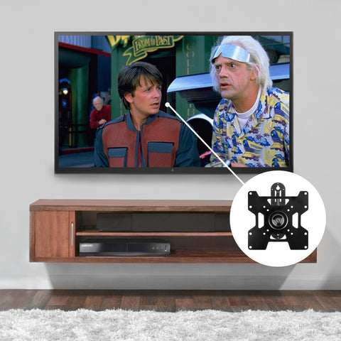 Duronic  TV Bracket showing a movie scene above a floating media console with a bracket overlay.
