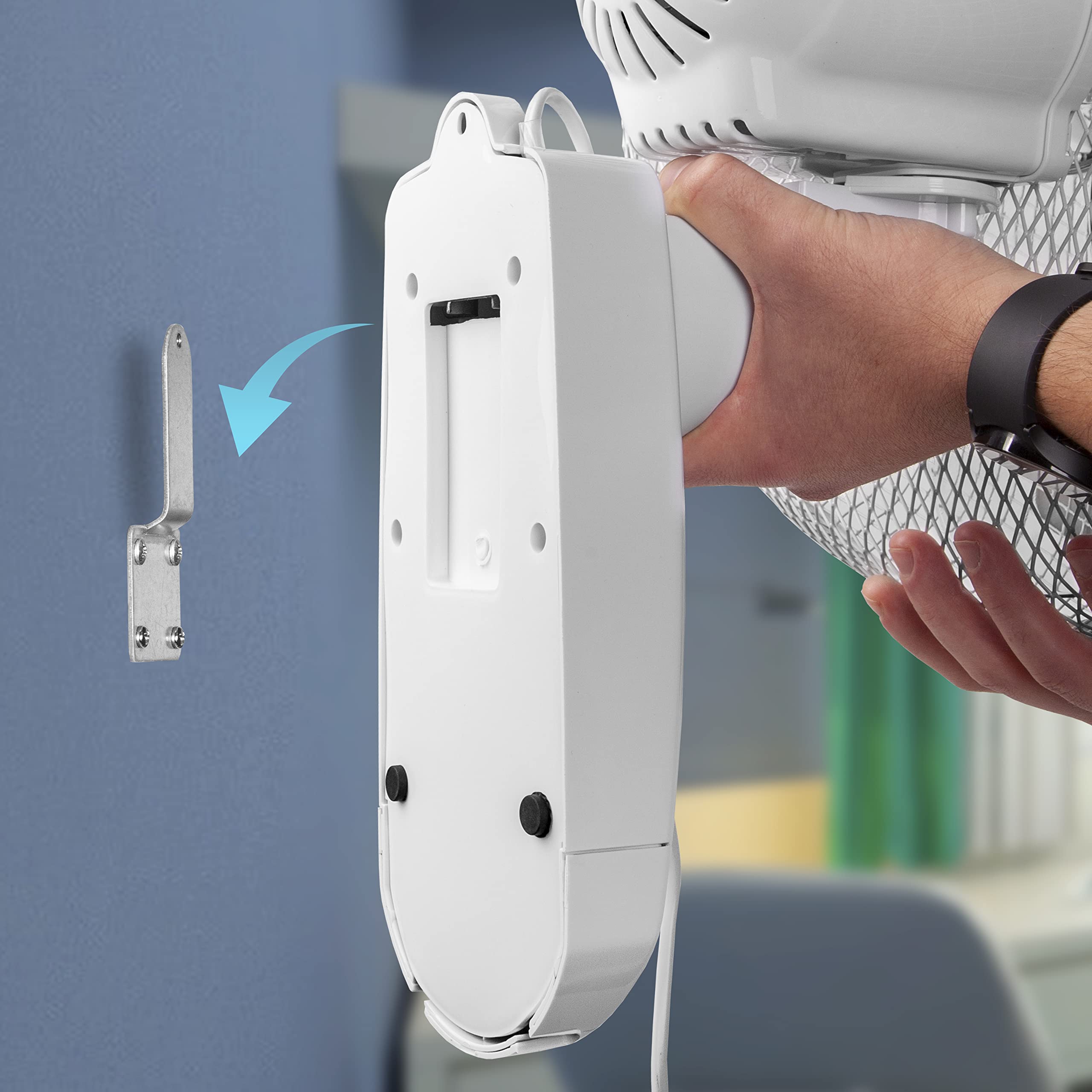 Duronic Wall Mounted Fan with hand holding to align with a silver metal mounting bracket.