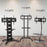 Three mobile TV stands (TVS4T1, TVS5T1, TVS3F1) in different styles displayed on a wooden floor.